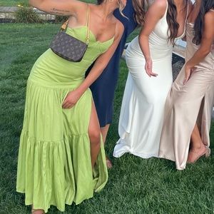 Green long dress with slit. Only worn once, size small.